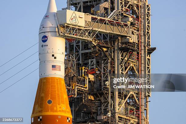 S Artemis II Space Launch System rocket and Orion spacecraft rest on Launch Pad 39B at Kennedy Space Center in Cape Canaveral, Florida, on March 31...