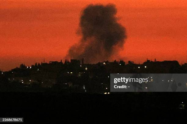 Smoke rises following an Israeli airstrike on the village of Mayfadoun in southern Lebanon as seen from nearby Marjeyoun on March 31, 2026. Lebanon...