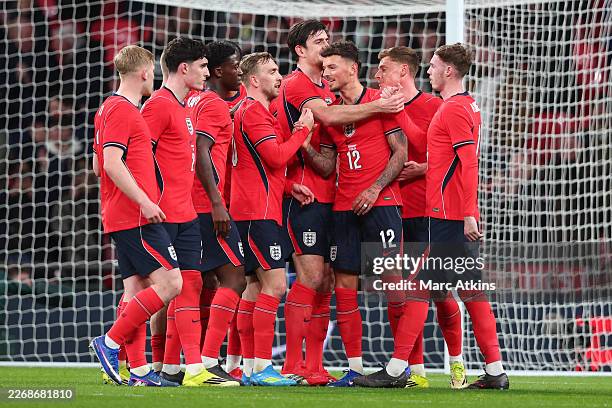 Ben White of England celebrates scoring the first goal with team mates during the international friendly match between England and Uruguay at Wembley...