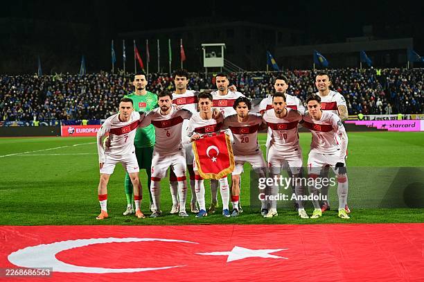Players of Turkiye pose for a team photo ahead of the 2026 FIFA World Cup Europe Qualifiers play-off final match between Kosovo and Turkiye at the...