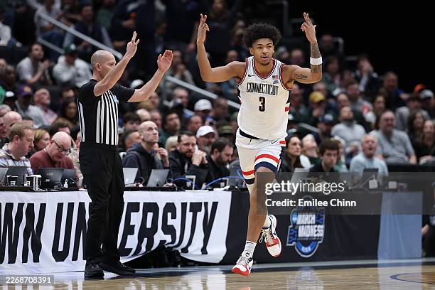 Jaylin Stewart of the UConn Huskies reacts after shooting a three point basket against the Michigan State Spartans during the first half in the Sweet...