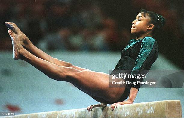 Dominique Dawes performs on the Balance Beam during the compulsory''s at the USA Gymnastics National Championships. Dawes, the Olympic hopeful, is in...