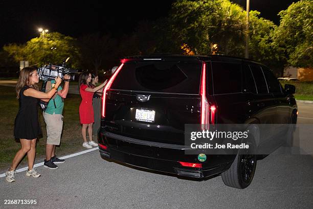 Vehicle carrying Tiger Woods leaves the Martin County Jail after he was arrested for driving under the influence after a car crash on March 27, 2026...