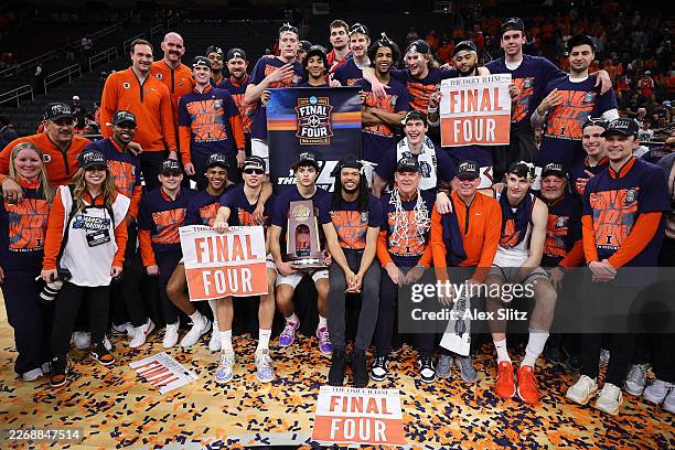 The Illinois Fighting Illini pose after defeating the Iowa Hawkeyes in the Elite Eight of the 2026 NCAA Men's Basketball Tournament at Toyota Center...