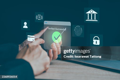 Two step authentication concept with user logging into system on laptop and confirming identity via smartphone. Secure access, fingerprint scan, and encrypted data ensure online banking safety Two step authentication concept with user logging into system on laptop and confirming identity via smartphone. Secure access, fingerprint scan, and encrypted data ensure online banking safety