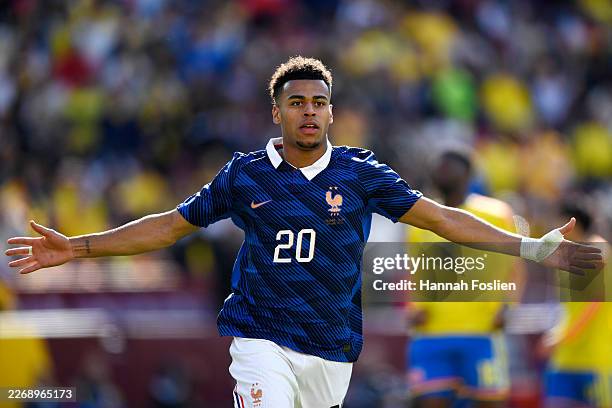 Desire Doue of France celebrates scoring his team's third goal during the international friendly match between Colombia and France at Northwest...