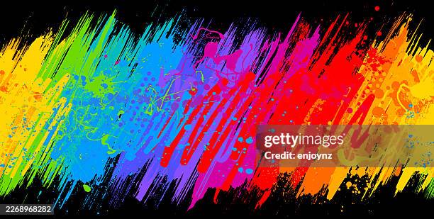 seamless vibrant rainbow brush stroke burst on black background - high contrast stock illustrations