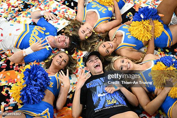 Gabriela Jaquez of the UCLA Bruins celebrates with the cheerleaders after defeating the Duke Blue Devils 70-58 in the Elite Eight of the 2026 NCAA...