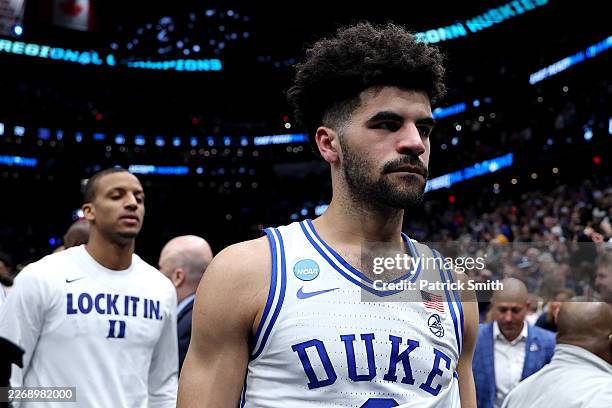 Cayden Boozer of the Duke Blue Devils walks off the court after being defeated by the UConn Huskies 73-72 in the Elite Eight of the 2026 NCAA Men's...