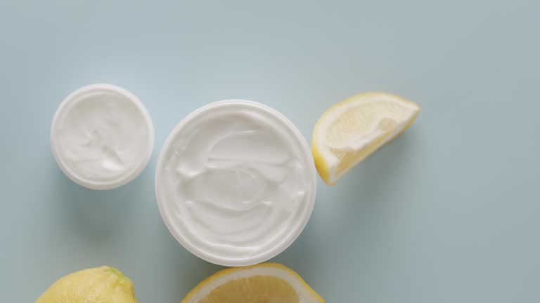 https://media.gettyimages.com/id/2269014555/video/white-bottles-and-tubes-with-lemon-fruit-spin-for-cosmetics-top-view-top-view.jpg?b=1&s=640x640&k=20&c=Z0jAzzhoDVB3R-mvbQHuYuZfNoPbePcyDHiNeU6iGrE=