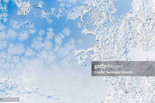 hoar frost and ice crystals on a window - ice crystal stock pictures, royalty-free photos & images