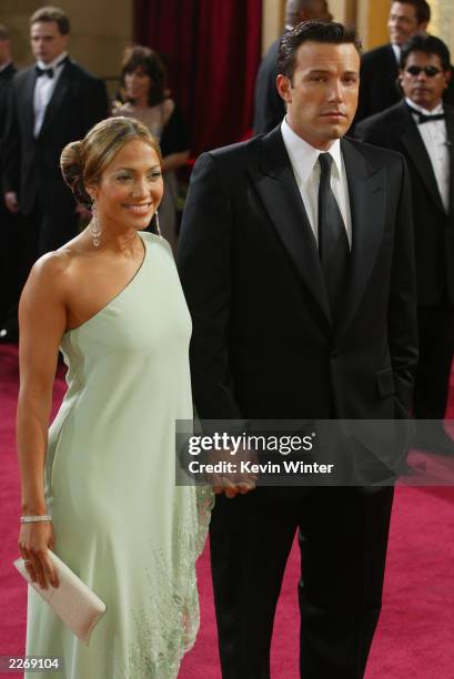 Actress Jennifer Lopez, wearing Harry Winston jewelry, and actor Ben Affleck attend the 75th Annual Academy Awards at the Kodak Theater on March 23,...