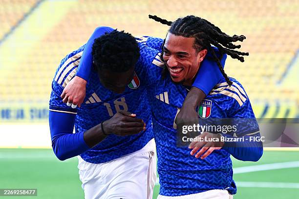 Luca Koleosho of Italy U21 celebrates after scoring his team's second goal with Jeff Ekhator of Italy U21 during the UEFA Under 21 EURO Qualifier...