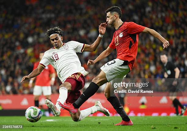 Lamine Yamal of Spain challenges Ahmed Fatouh of Egypt during an international friendly match between Spain and Egypt at RCDE Stadium on March 31,...