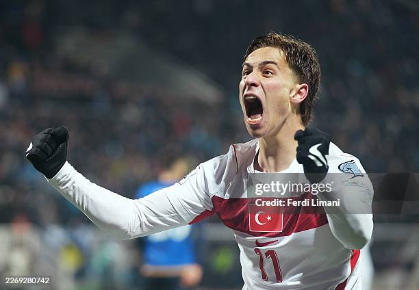 Kenan Yildiz of Turkiye celebrates his team's first goal scored by teammate Kerem Aktuerkoglu during the FIFA World Cup 2026 European Qualifiers KO...