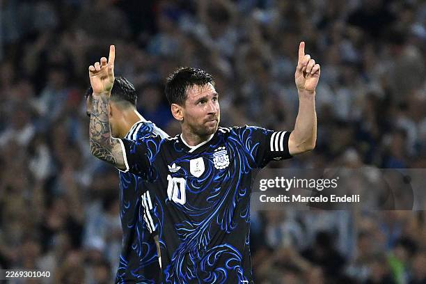 Lionel Messi of Argentina celebrates after scoring his team's second goal during the international friendly match between Argentina and Zambia at...