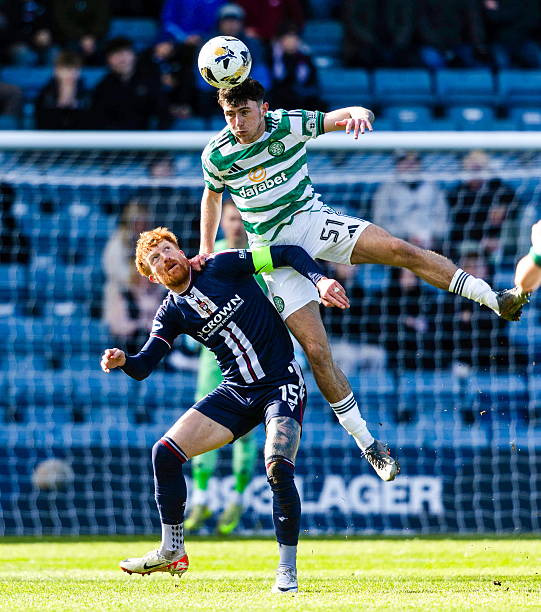 Celtic's Colby Donovan and Dundee's Simon Murray in action during a William Hill Premiership match between Dundee and Celtic at Dens Park, on April...