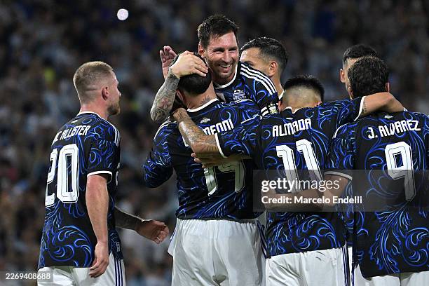 Nicolas Otamendi of Argentina celebrates with teammates after scoring his team's third goal during the international friendly match between Argentina...