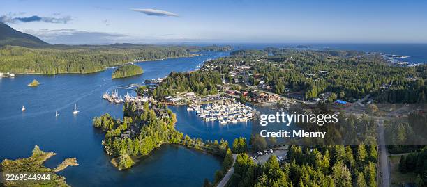 ucluelet harbor aerial view with marina forested coastline vancouver island british columbia - coastline stock pictures, royalty-free photos & images