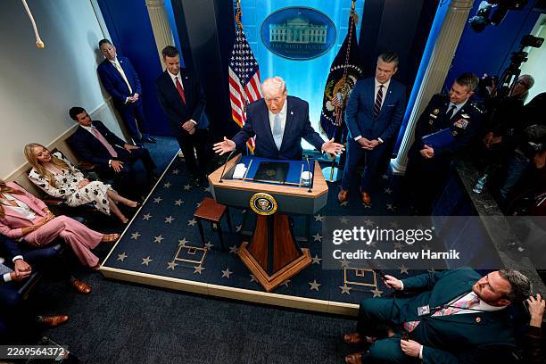 President Donald Trump, accompanied by CIA Director John Ratcliffe , Secretary of War Pete Hegseth and Chairman of the Joint Chiefs of Staff General...