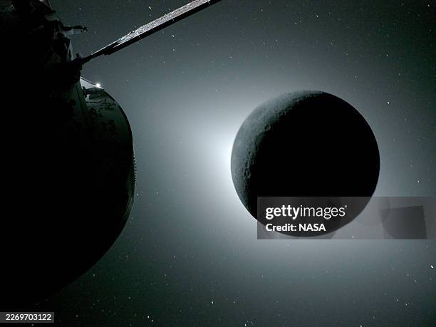 In this handout image provided by NASA, The Moon, seen here backlit by the Sun during a solar eclipse on April 6 is photographed by one of the...