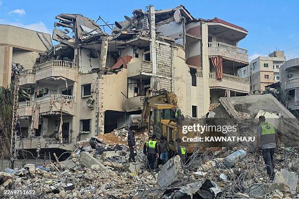 First responders work at the site of an Israeli airstrike in the southern Lebanese city of Tyre on April 8, 2026. The Israeli military warned...