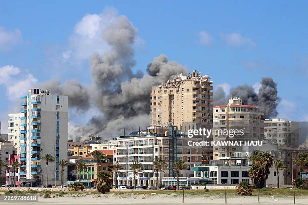 Smoke rises from the site of an Israeli strike that targeted an area in the Lebanese coastal city of Tyre on April 8, 2026. Israel launched a series...