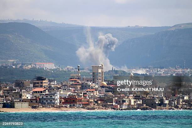 Smoke rises from the site of an Israeli airstrike that targeted an area on the outskirts of the southern Lebanese city of Tyre on April 8, 2026....