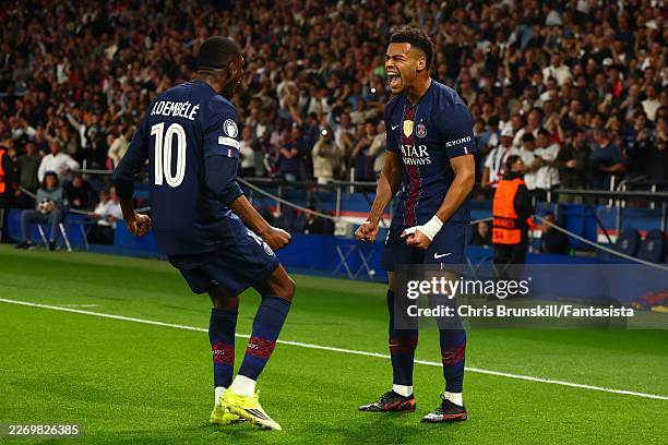 Desire Doue of Paris Saint-Germain celebrates scoring a goal to make the score 1-0 with Ousmane Dembele during the UEFA Champions League 2025/26...