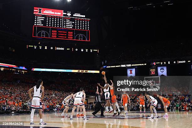 Tarris Reed Jr. #5 of the UConn Huskies jumps for the ball against Tomislav Ivisic of the Illinois Fighting Illini in the Final Four of the 2026 NCAA...