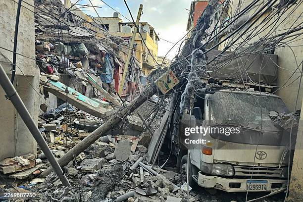Picture taken on April 9, 2026 shows the aftermath of the previous day's Israeli airstrikes that targeted southern Beirut's al-Rihab neighbourhood....