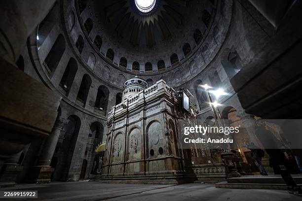 Christian clergy perform the traditional washing of the feet ceremony at the Church of the Holy Sepulchre on Holy Thursday in the Old City of...