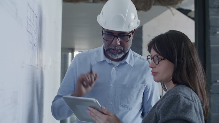 https://media.gettyimages.com/id/2270131753/video/engineer-discussing-architectural-drawings-with-female-associate-on-site.jpg?b=1&s=640x640&k=20&c=Ga-ivpQOVDOWsG_9ALWd1u8ipzgeY85MWdQPMZKUIxY=