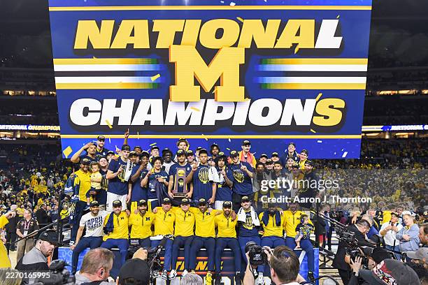 The Michigan Wolverines Basketball Team poses for a photo after winning the 2026 NCAA Men's Basketball Tournament national championship game against...