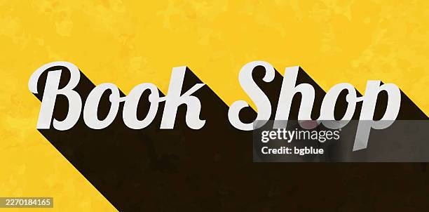 book shop - text with long shadow on textured yellow background - used bookstore stock illustrations