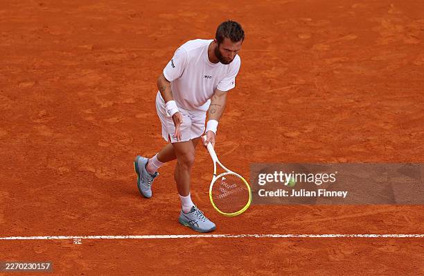Corentin Moutet of France plays an underarm serve to Alexandre Muller of France during day three of the Rolex Monte-Carlo Masters at Monte-Carlo...