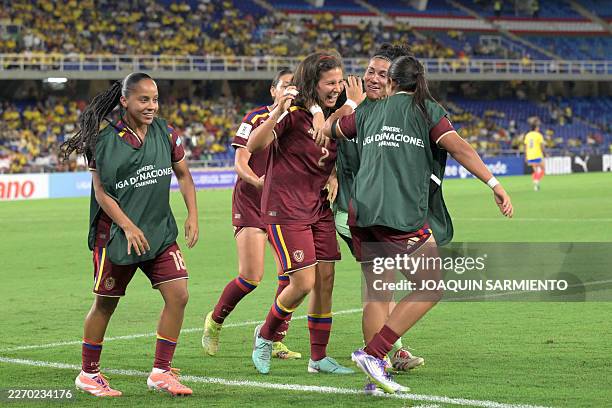 Venezuela's defender Veronica Herrera celebrates with teammates after scoring her team's first goal during the CONMEBOL Nations League Women football...