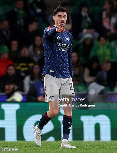 Kai Havertz of Arsenal celebrates scoring his team's first goal during the UEFA Champions League 2025/26 Quarter-Final First Leg match between...