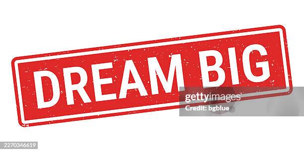 dream big - red rubber stamp on white background - dream big stock illustrations