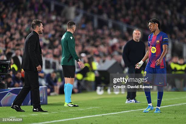 Lamine Yamal of FC Barcelona reacts as he speaks to Diego Simeone, Head Coach of Atletico de Madrid, during the UEFA Champions League 2025/26...