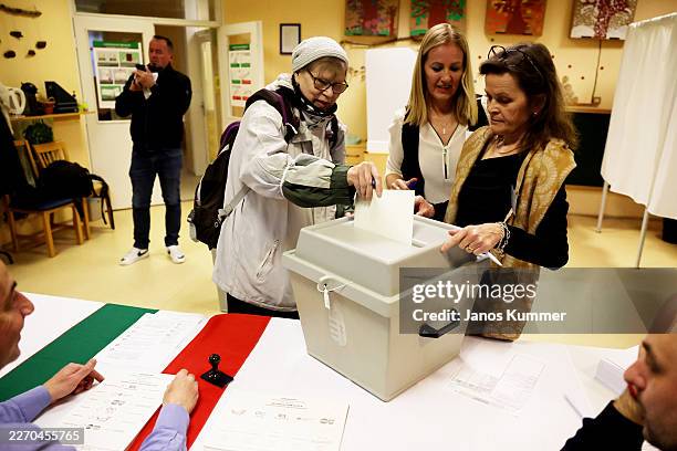People arrive to cast their votes during the Hungarian parliamentary elections at a polling station on April 12, 2026 in Budapest, Hungary. Hungarian...