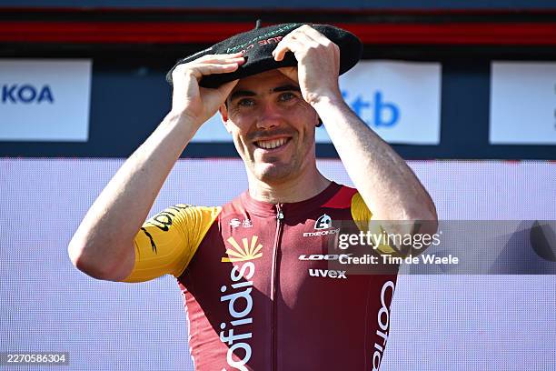Alex Aranburu of Spain and Team Cofidis celebrates at podium as stage winner with the "Txapela" hat trophy during the 65th Itzulia Basque Country...