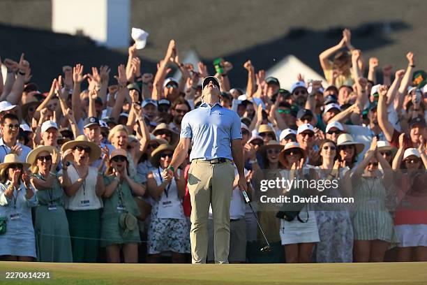Rory McIlroy of Northern Ireland celebrates holing the winning putt on the 18th hole during the final round of the 2026 Masters Tournament at Augusta...