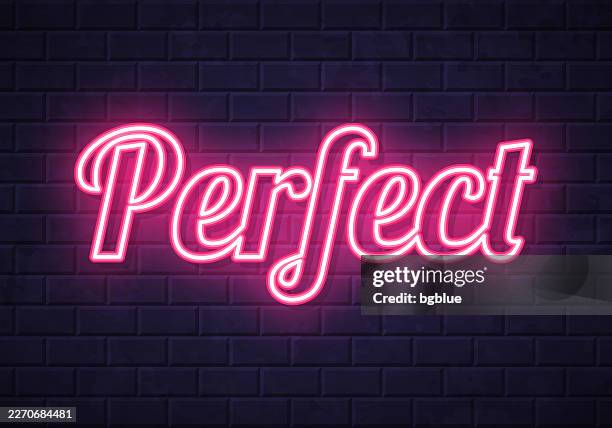 perfect - glowing neon text on brick wall background - obsessive compulsive stock illustrations