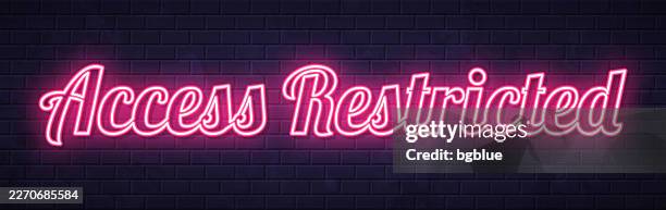 access restricted - glowing neon text on brick wall background - prohibited area stock illustrations