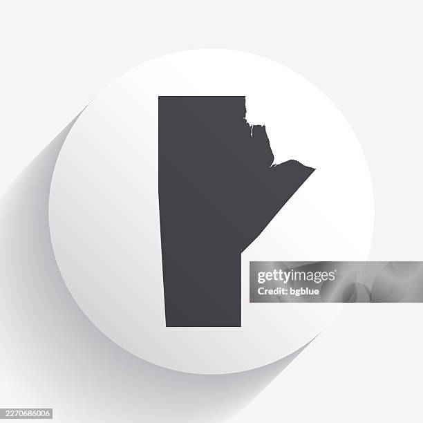 manitoba map on circle button with long shadow - winnipeg stock illustrations