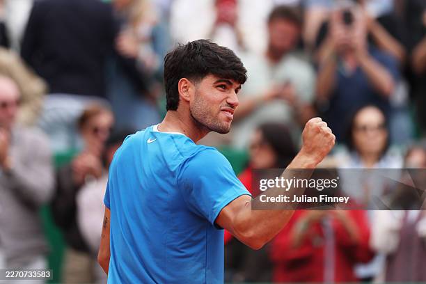Carlos Alcaraz of Spain celebrates after victory against Alexander Bublik of Kazakhstan in the Men's Singles Quarter Final match on day six of the...