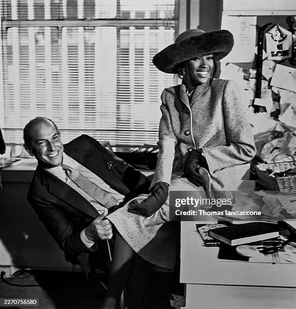 Portrait of Dominican fashion designer Oscar de la Renta and British fashion model Naomi Campbell, New York, New York, circa 1990.