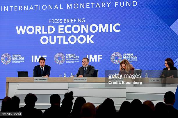 Jose Luis de Haro, communications officer at the International Monetary Fund , from left, Pierre Olivier Gourinchas, chief economist at the...