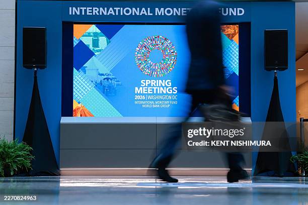 Man walks through the atrium during the 2026 IMF and World Bank Group Spring Meetings in Washington, DC, on April 14, 2026.